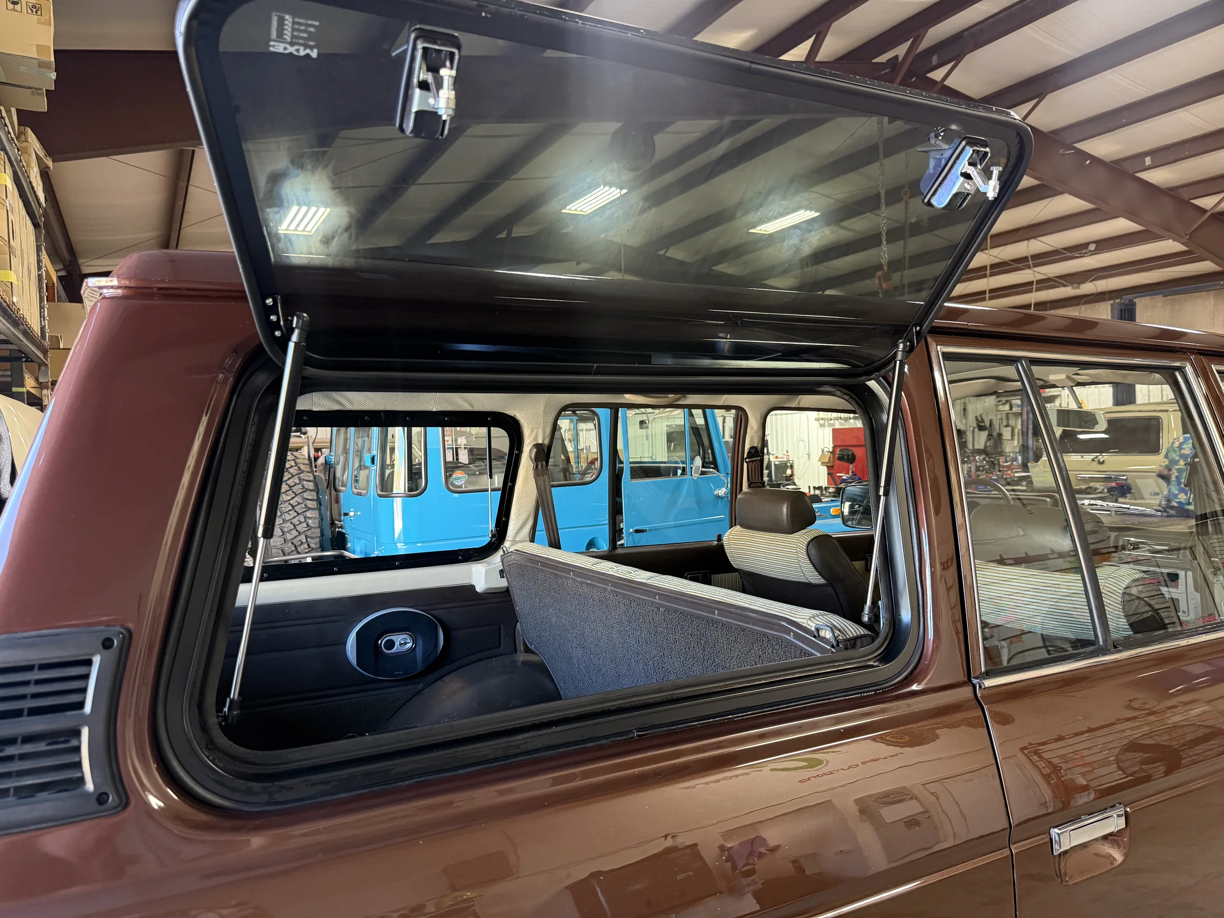 Open 3XM gull-wing cargo window installed in an FJ60