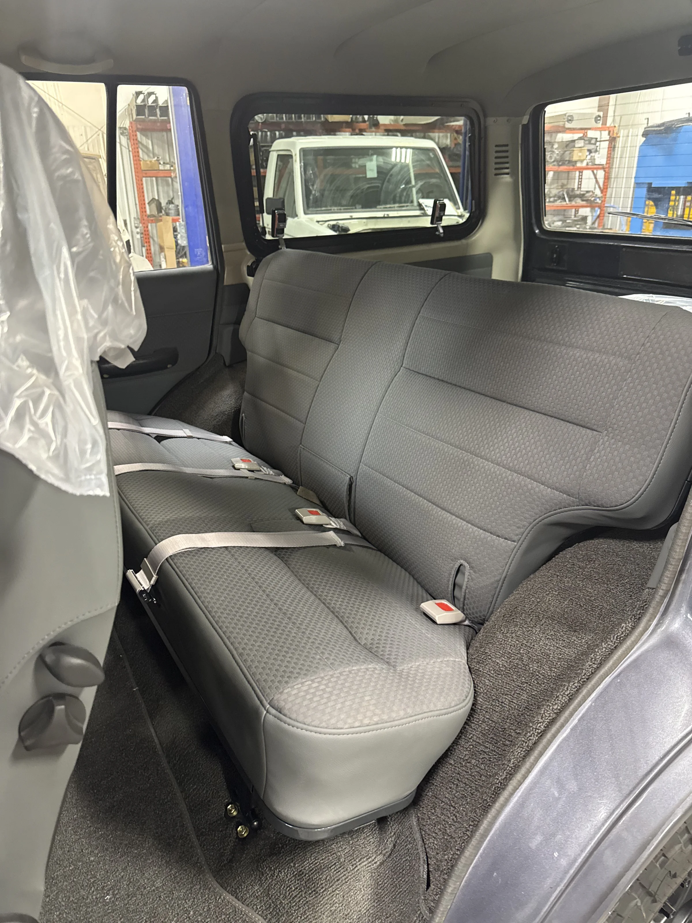 HJ60 rear seat recovered to match the new Scheel-Mann front seats
