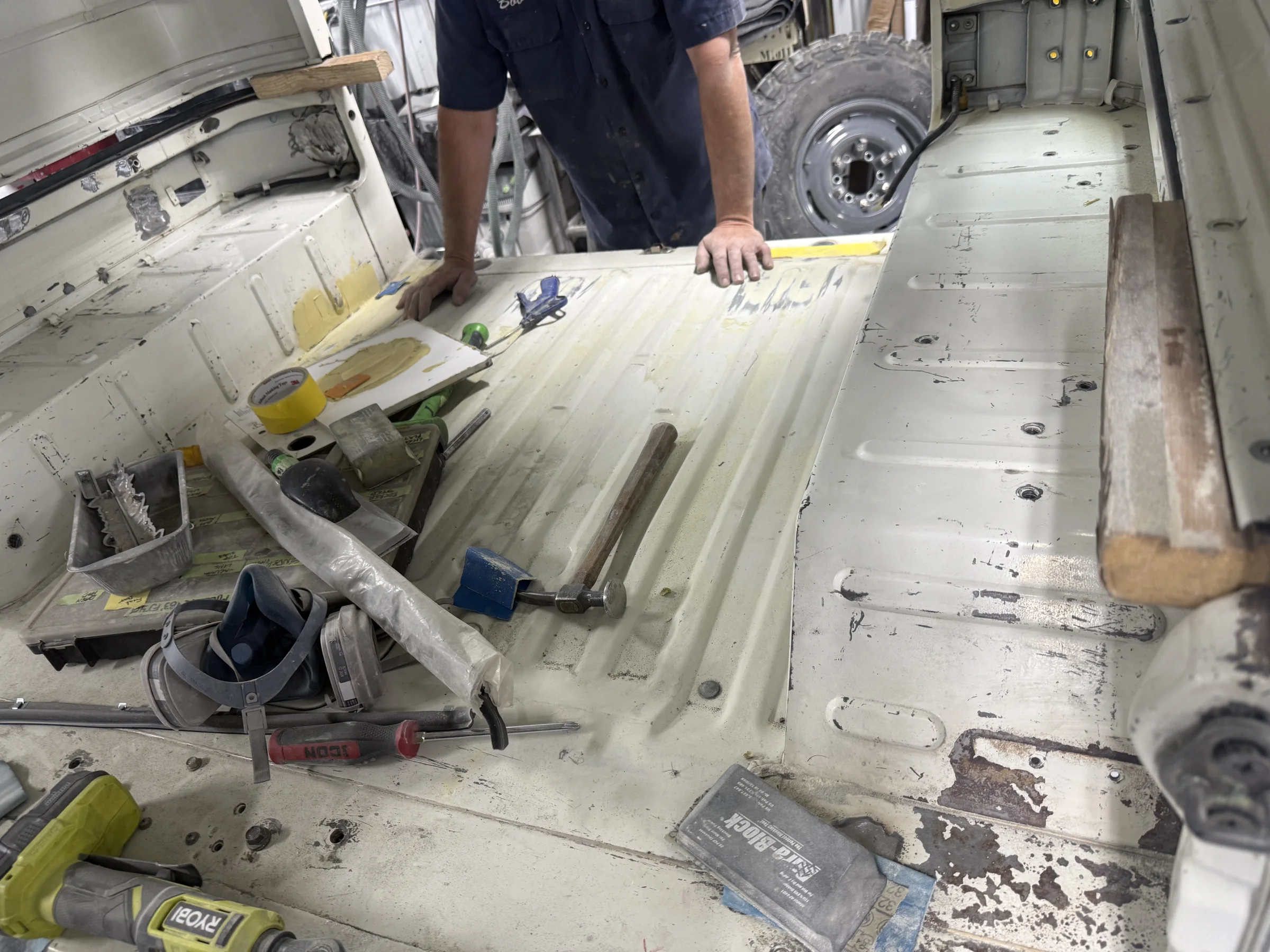 Floor and body repair work inside the rare 1983 Toyota FJ40