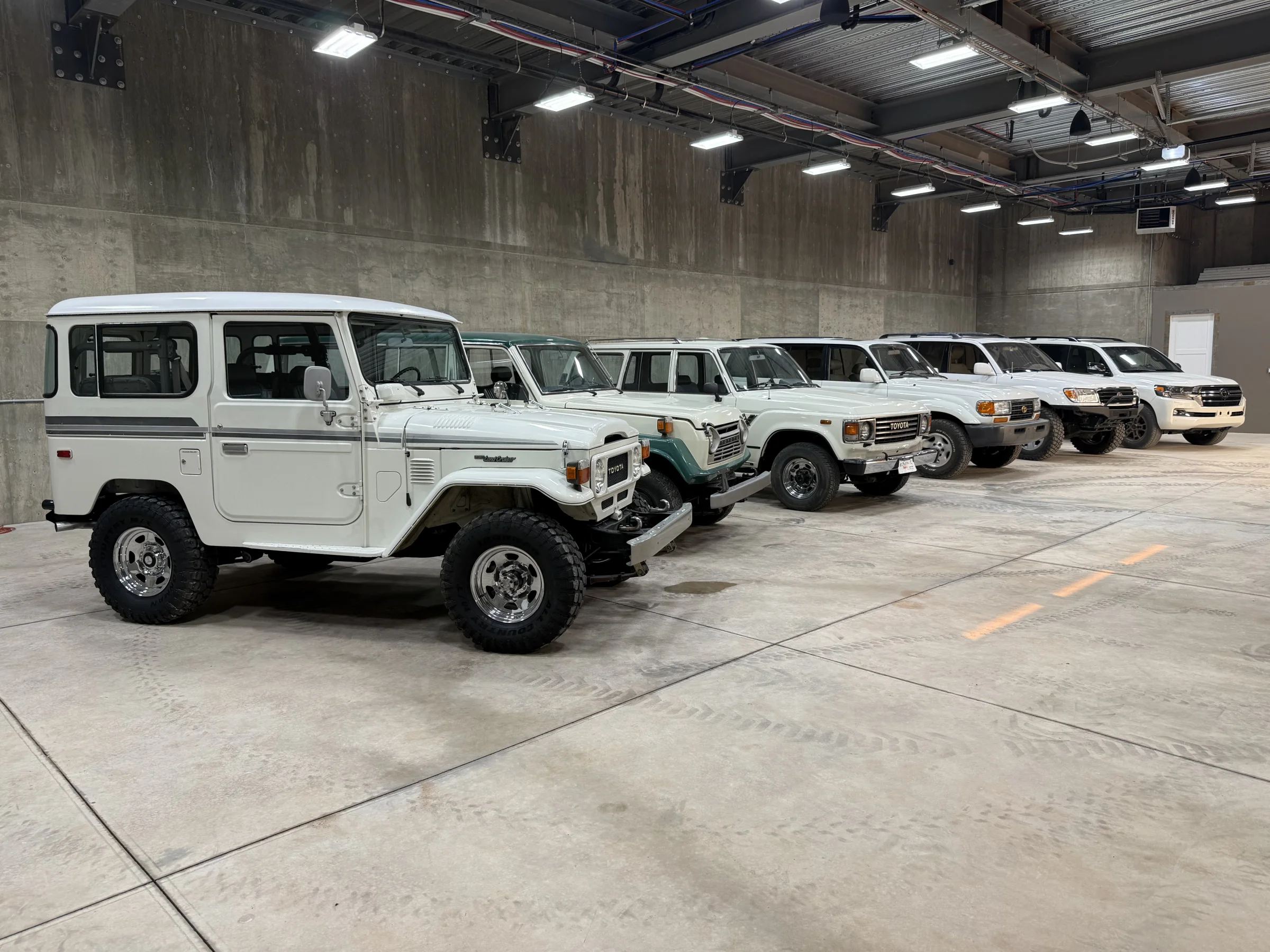Finished 1983 Toyota FJ40 at the front of a Land Cruiser collection