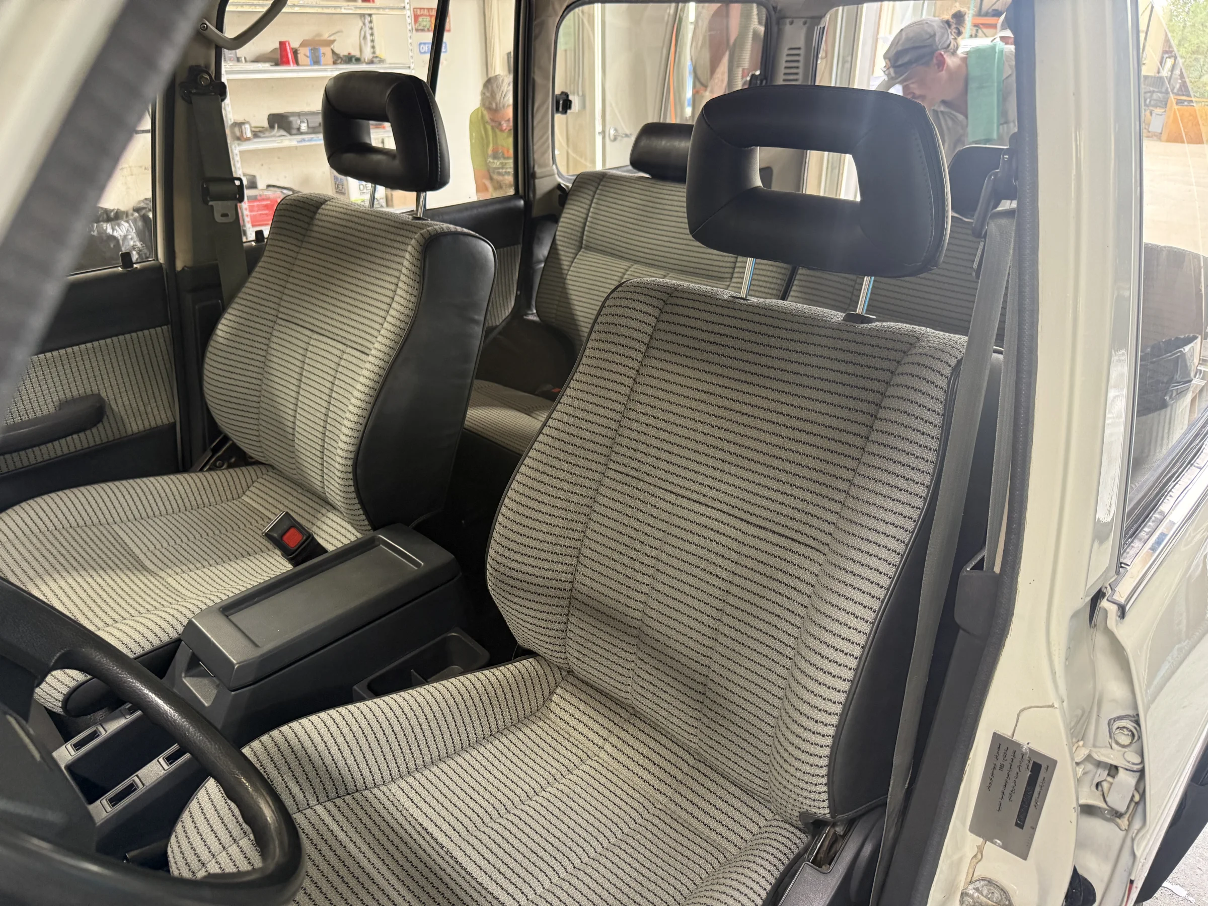 Front seats of the Saudi-import FJ62 recovered in OEM replica cloth