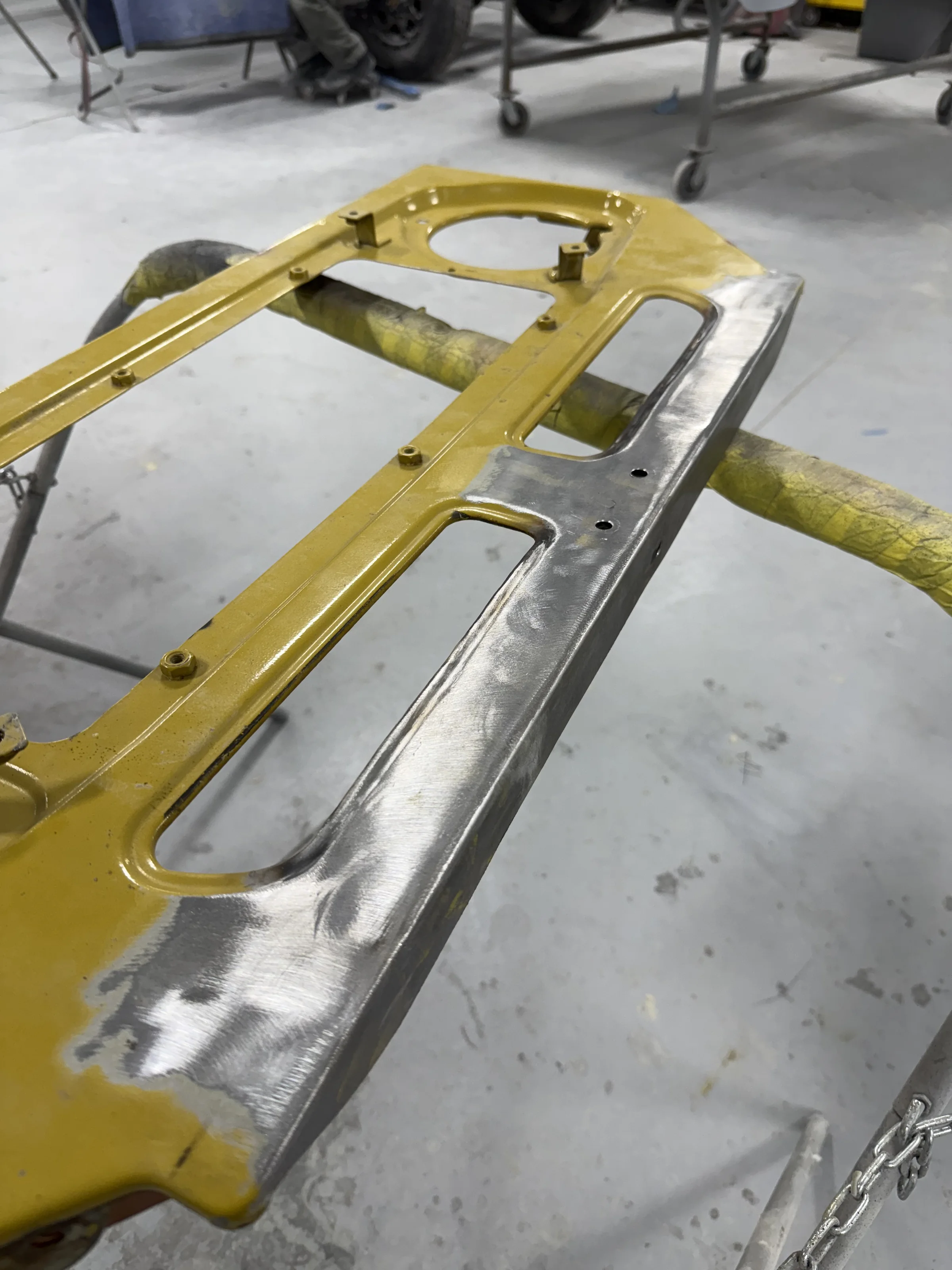 FJ40 front bib prepared during the rust-repair process