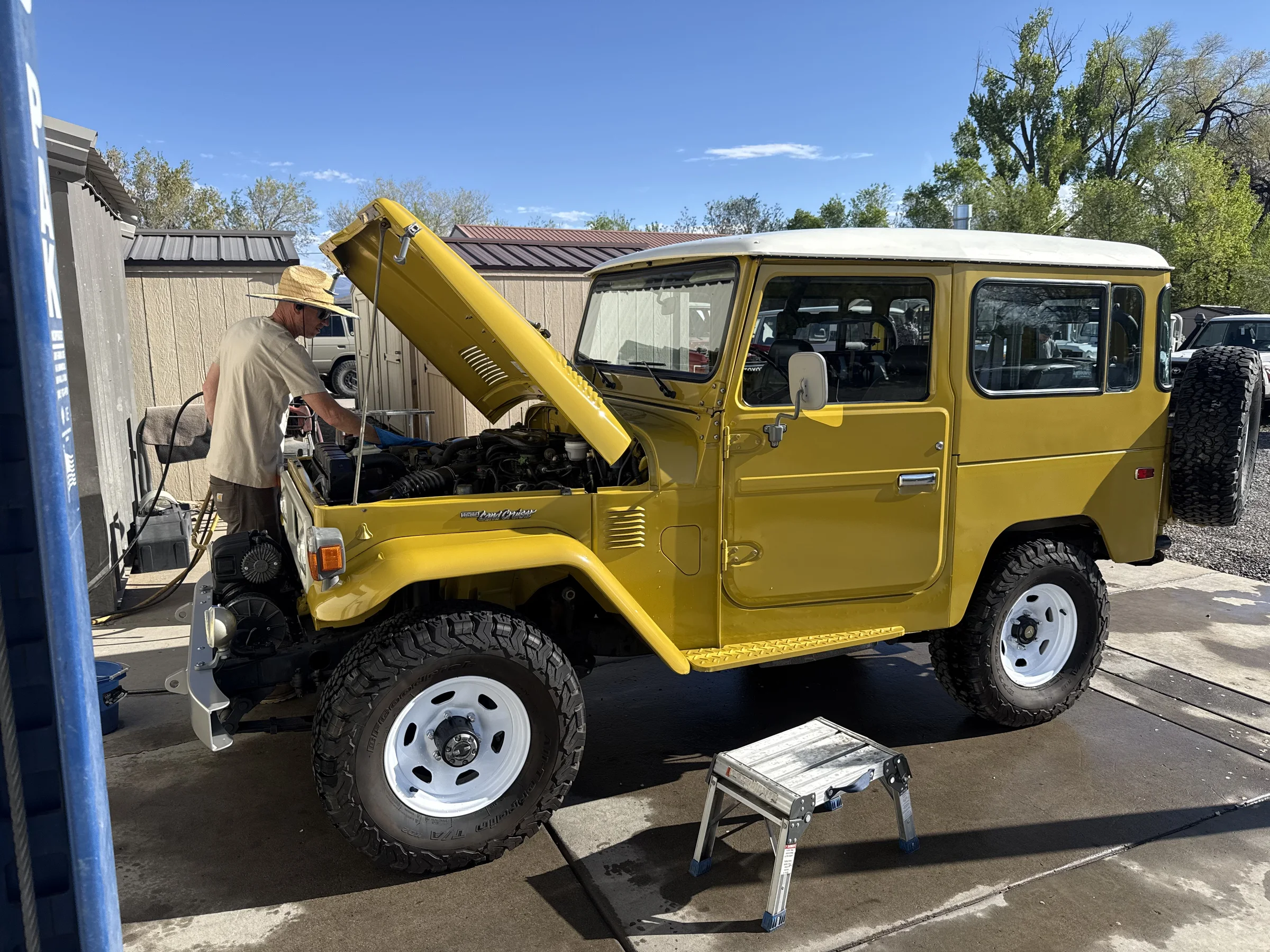 Survivor FJ40 receiving its mechanical inspection