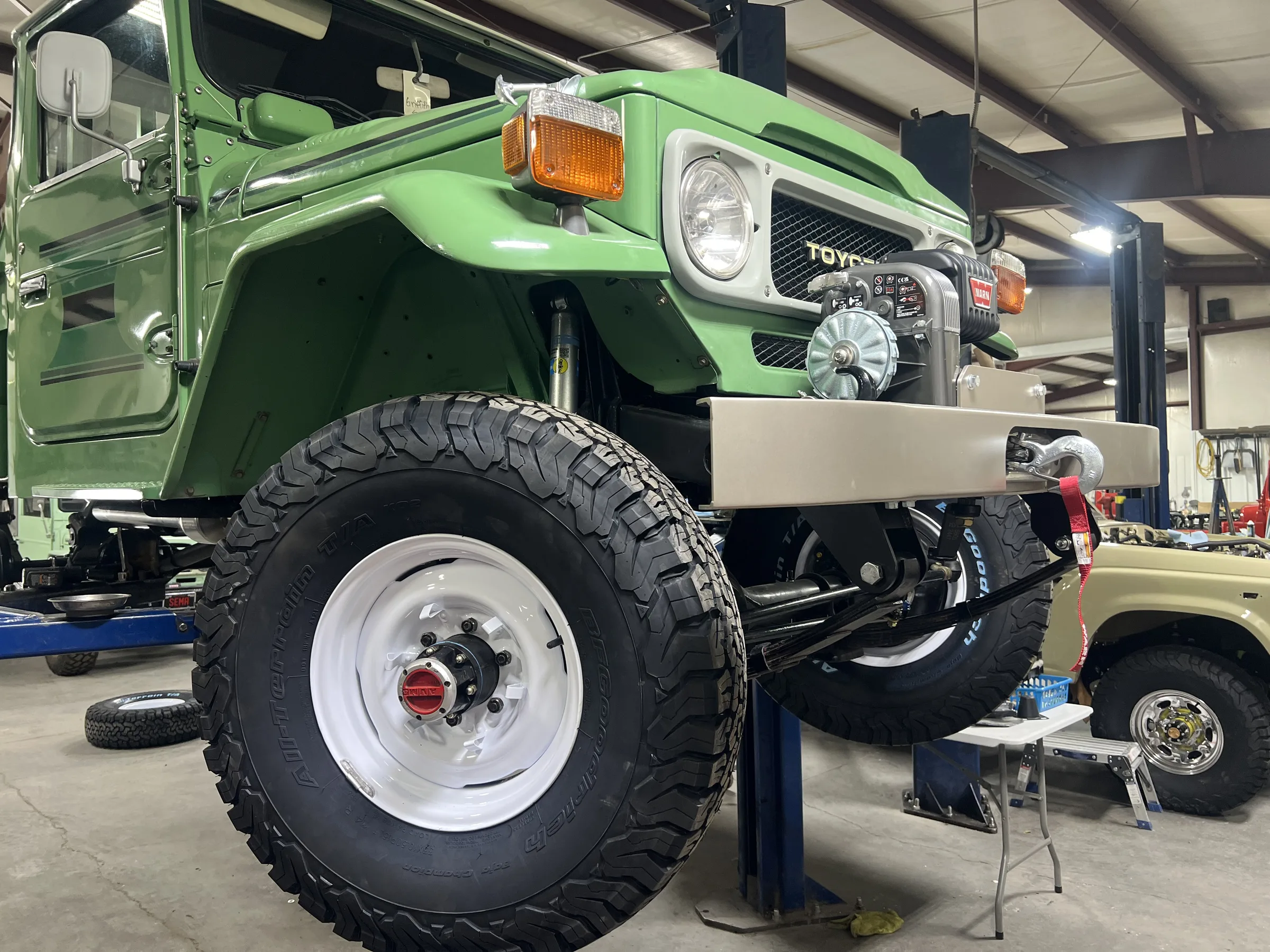 PRLC replica winch bar and WARN 8274 installed on the green FJ45