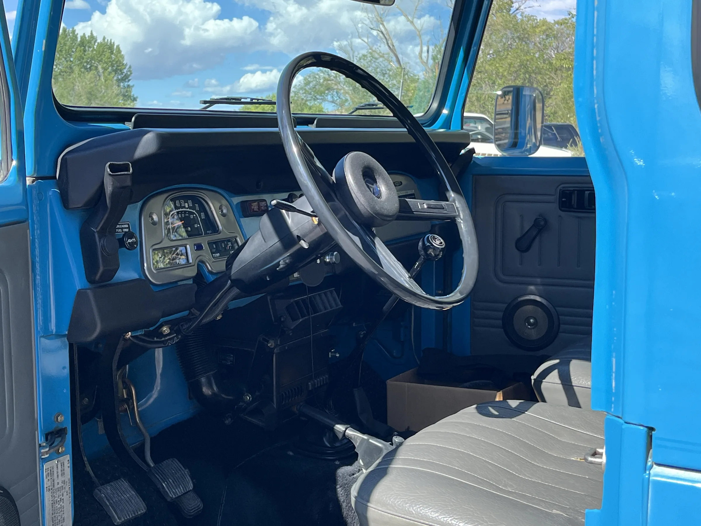 Original interior and dashboard of a Sky Blue 1980 Toyota Land Cruiser FJ40