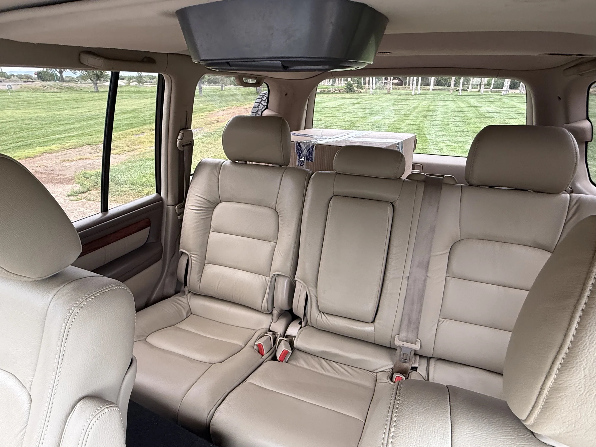 Katzkin leather rear seats in a white Lexus LX470