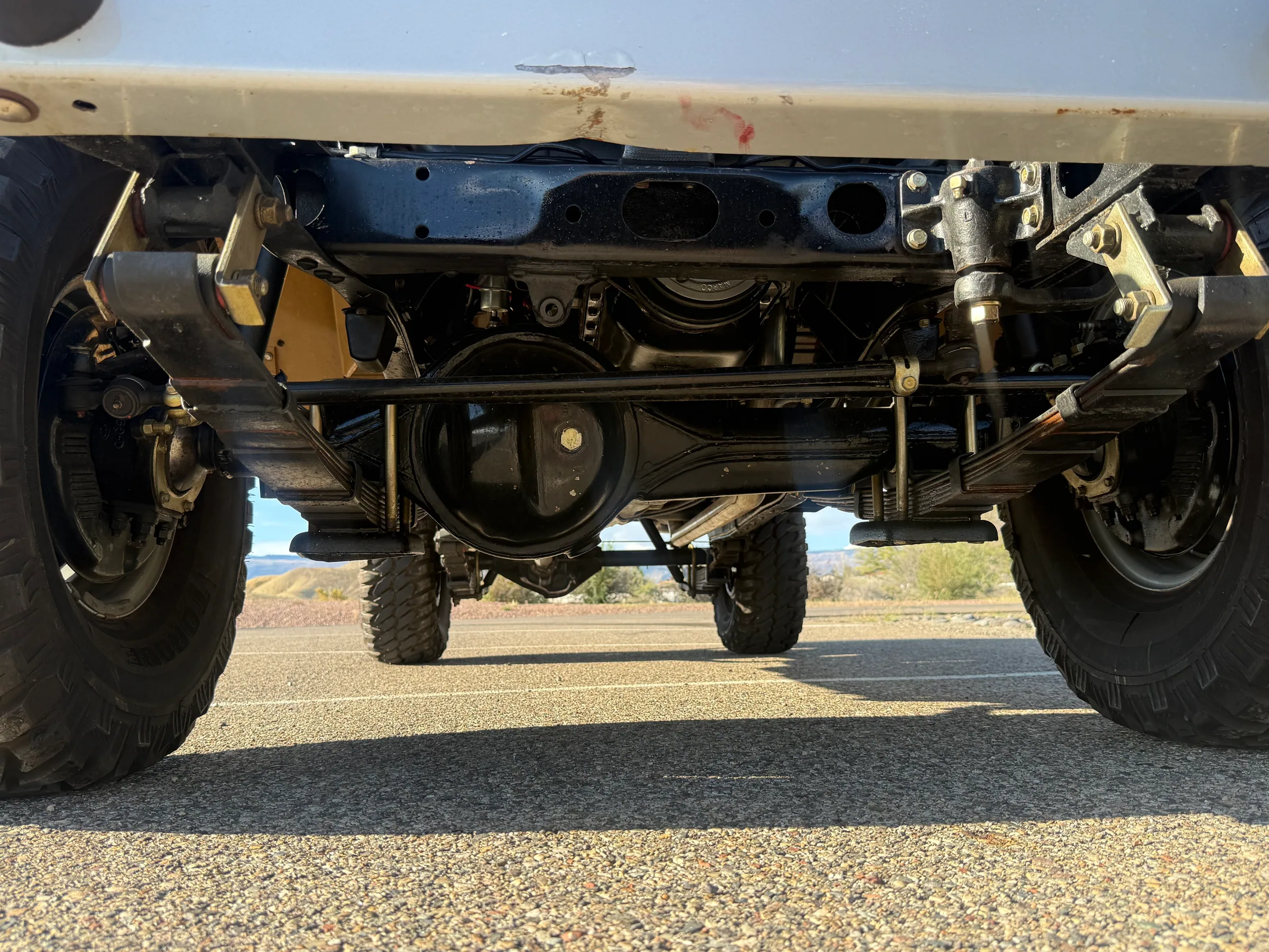 Front axle and leaf-spring suspension beneath the FJ45