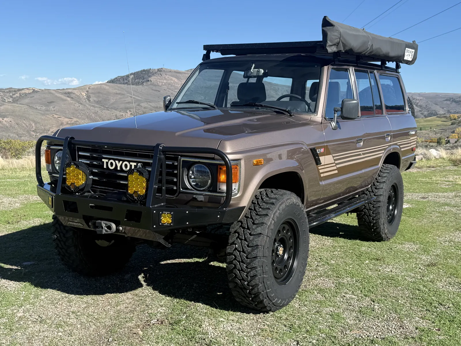 Front driver-side view of the lifted 1987 FJ60 restomod