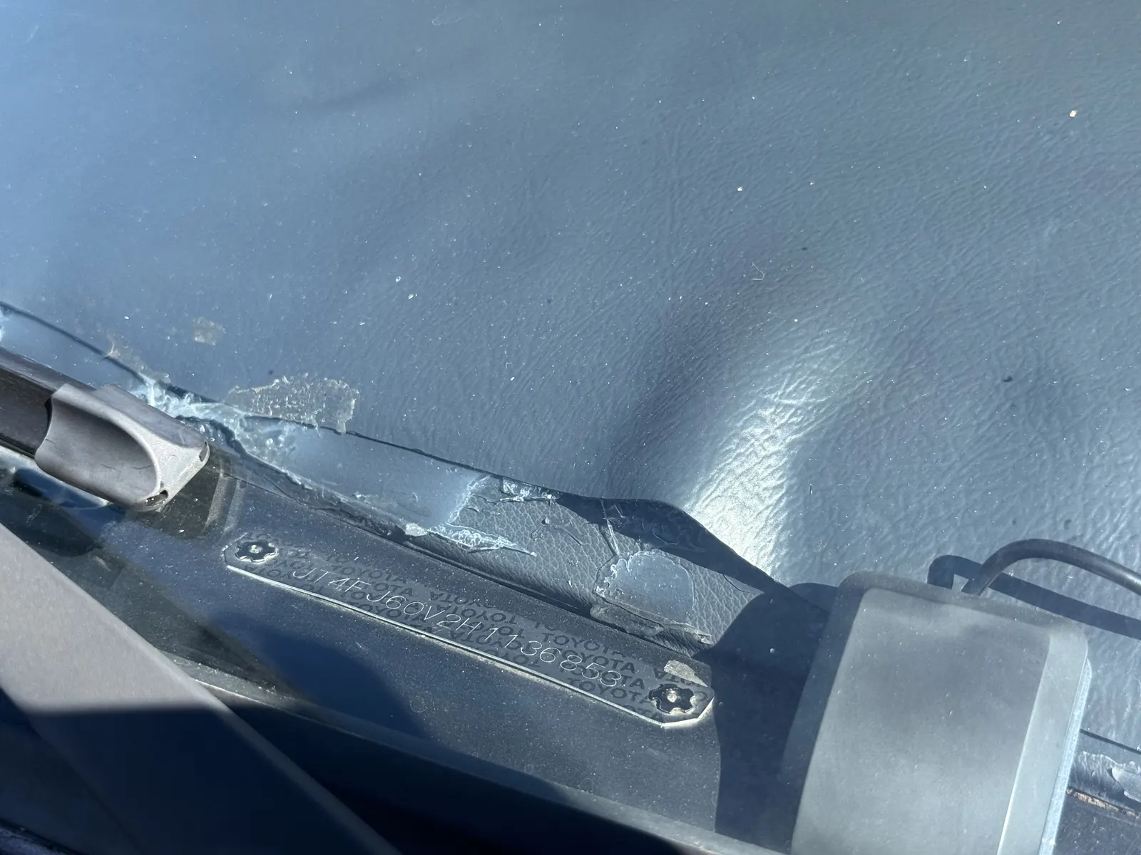Paint preparation flaw near the FJ60 windshield