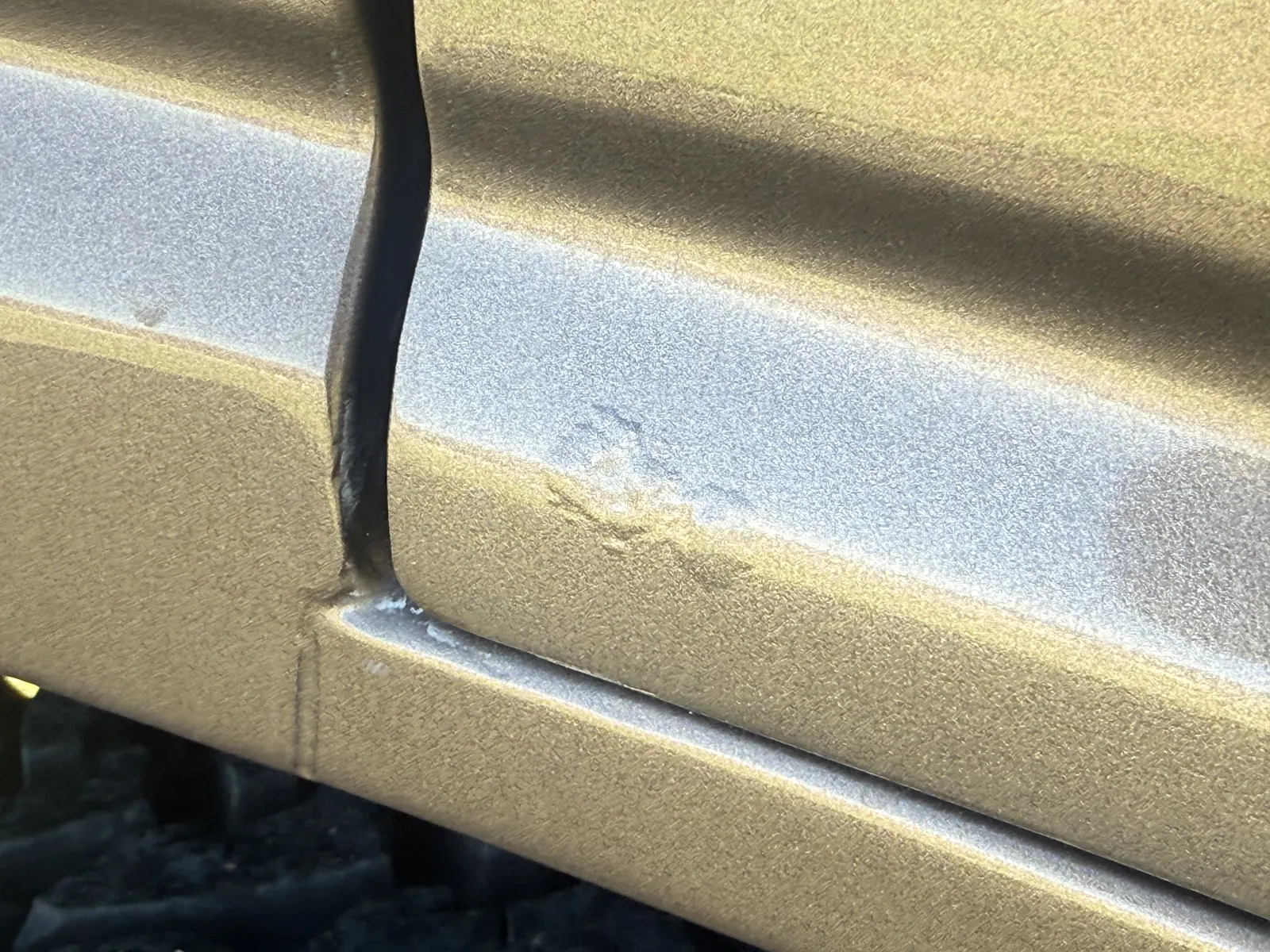 Surfacing rust on the passenger-side rear door