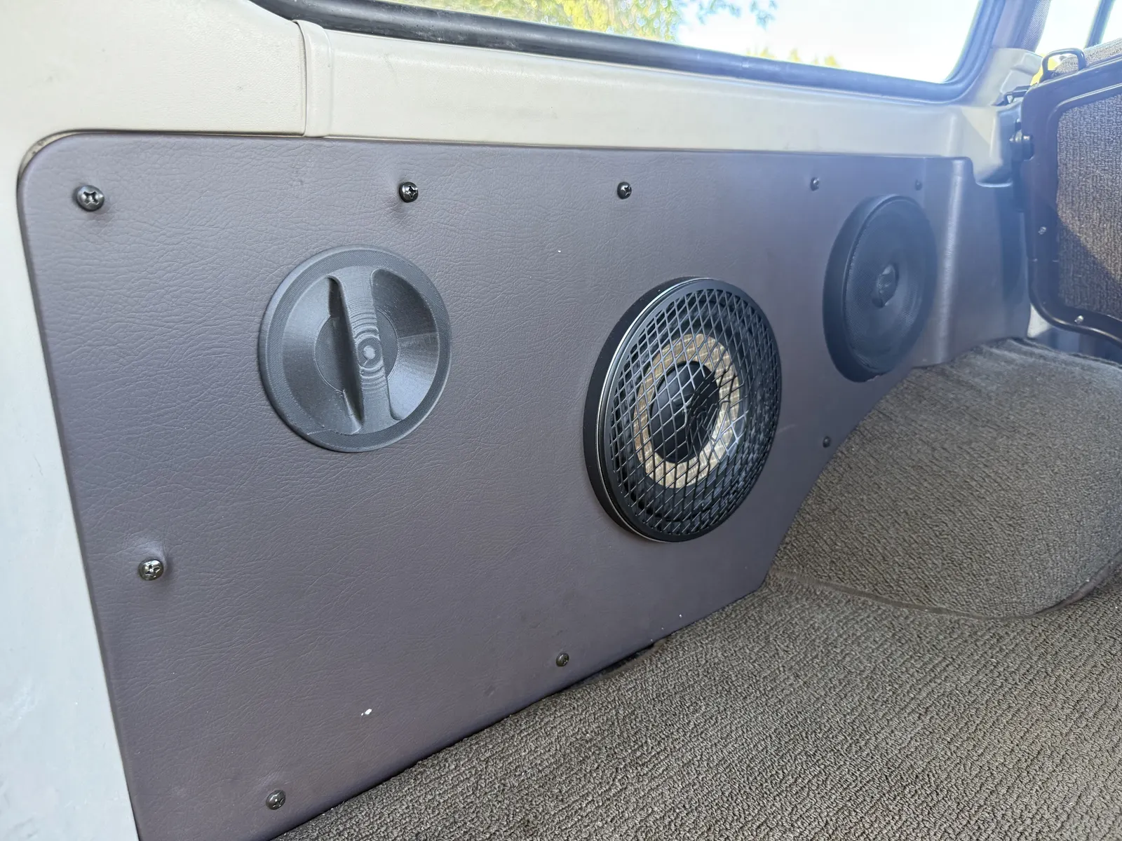 Custom cargo-area speaker installation in the 1988 FJ62