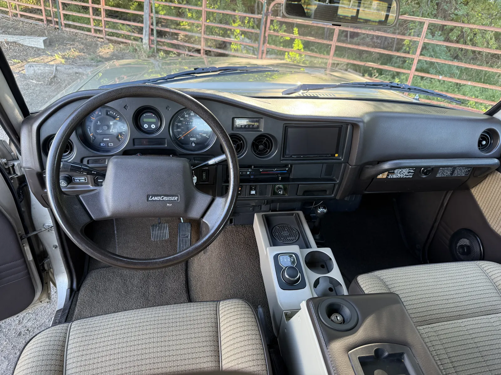 Driver cockpit and center console in the 1988 FJ62 Land Cruiser