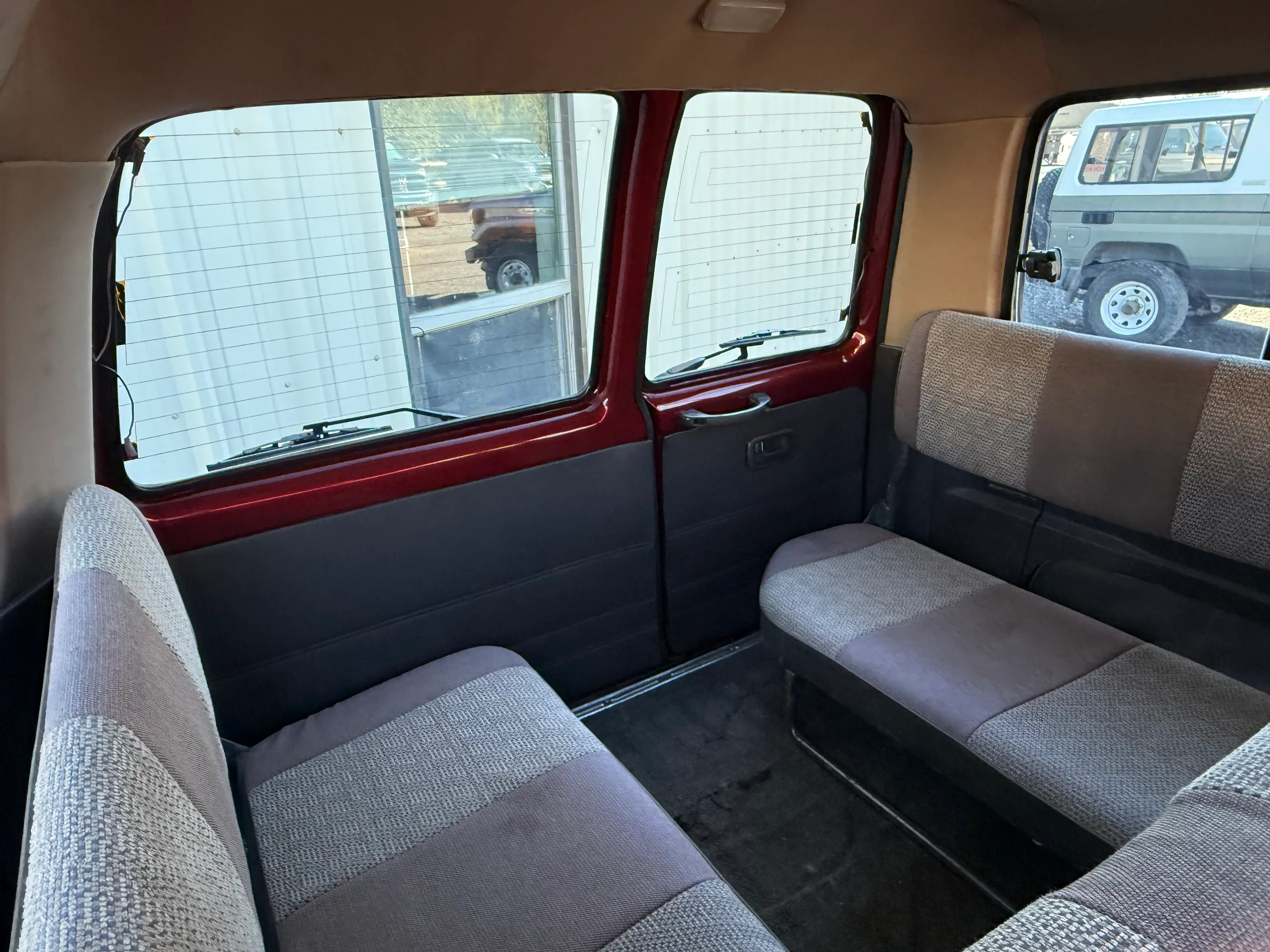 Rear jump seats and cargo area inside the 1990 FJ80