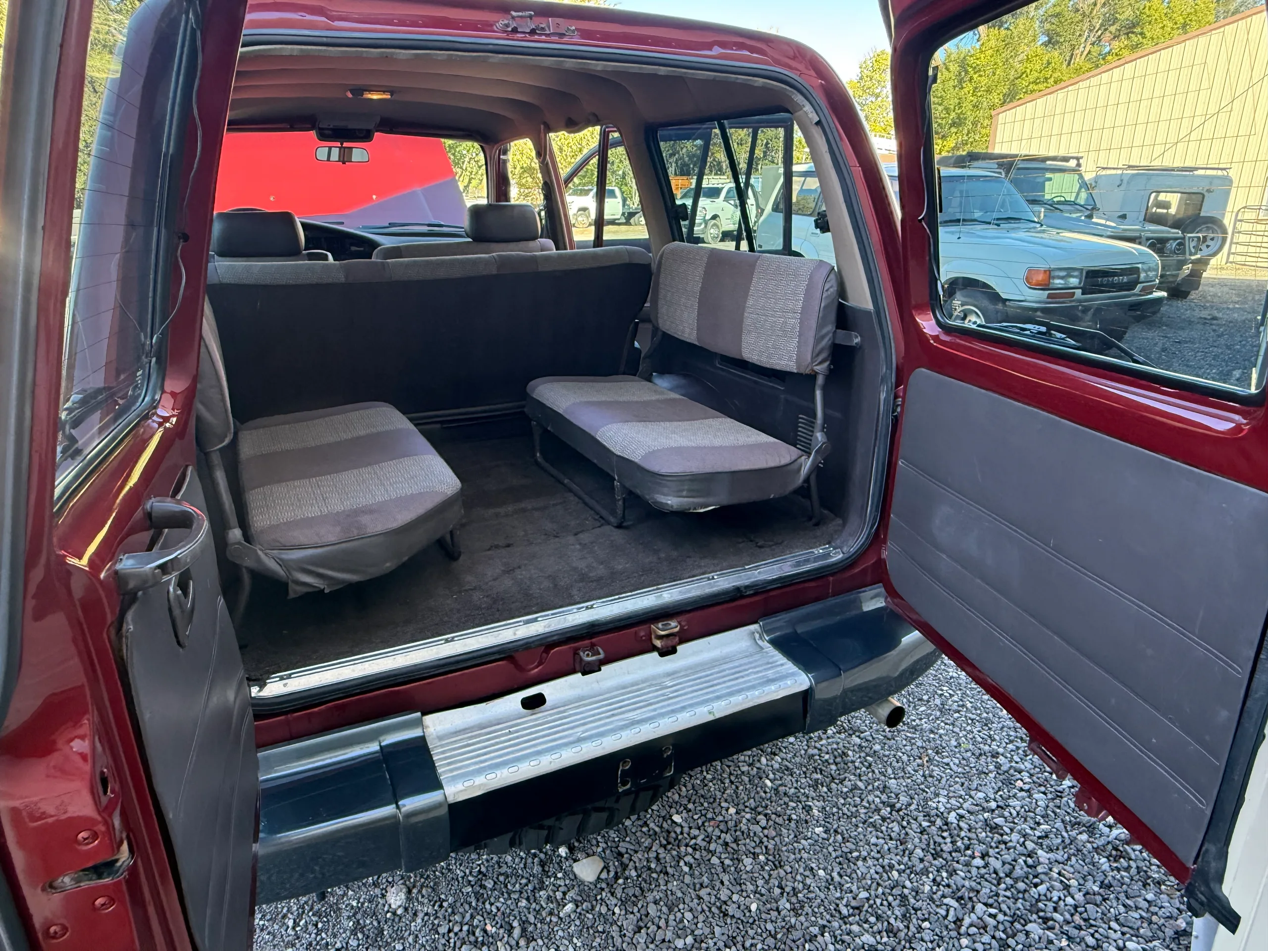 FJ80 cargo area and jump seats with both ambulance doors open