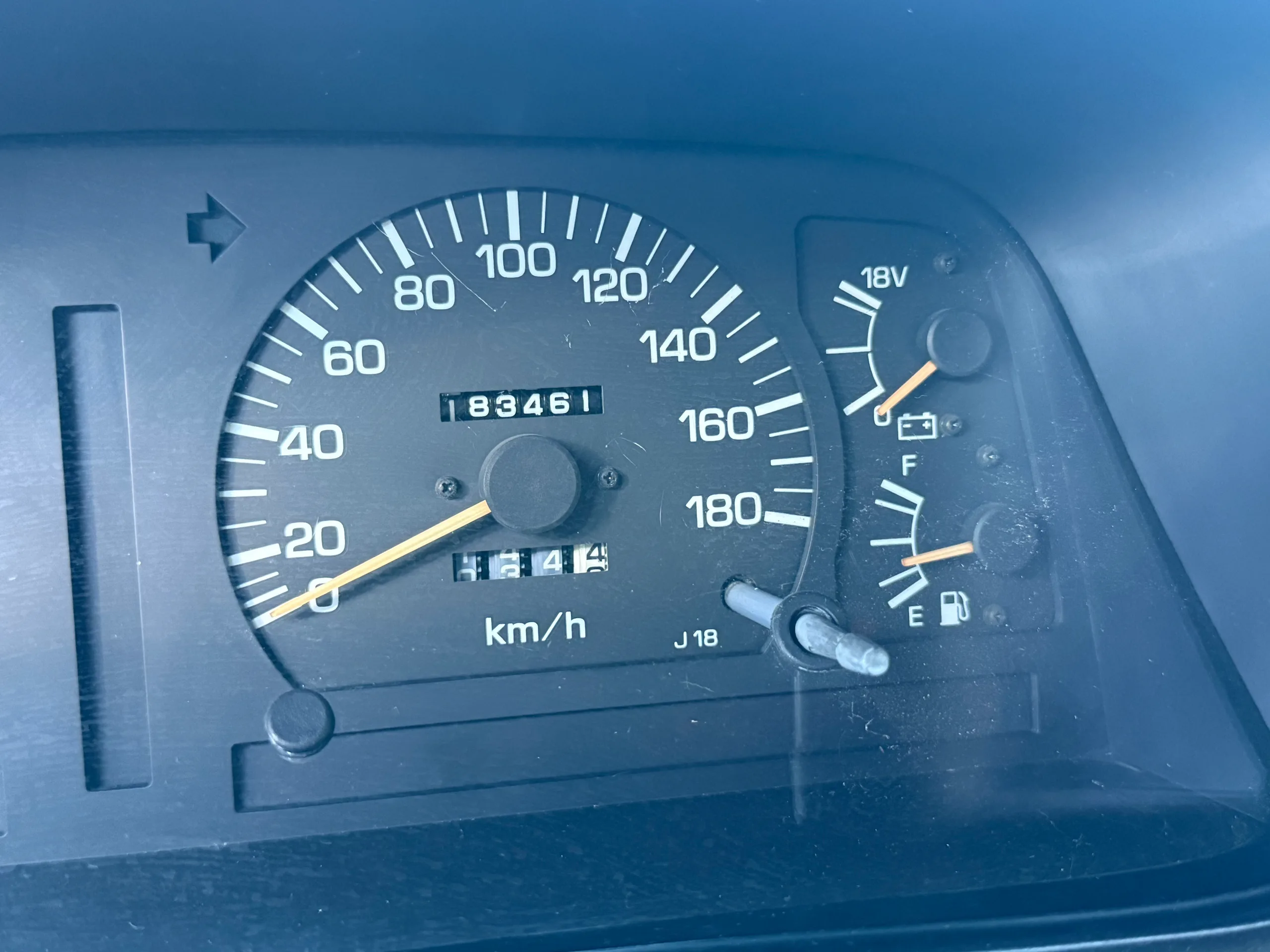 Metric instrument cluster showing the FJ80 odometer