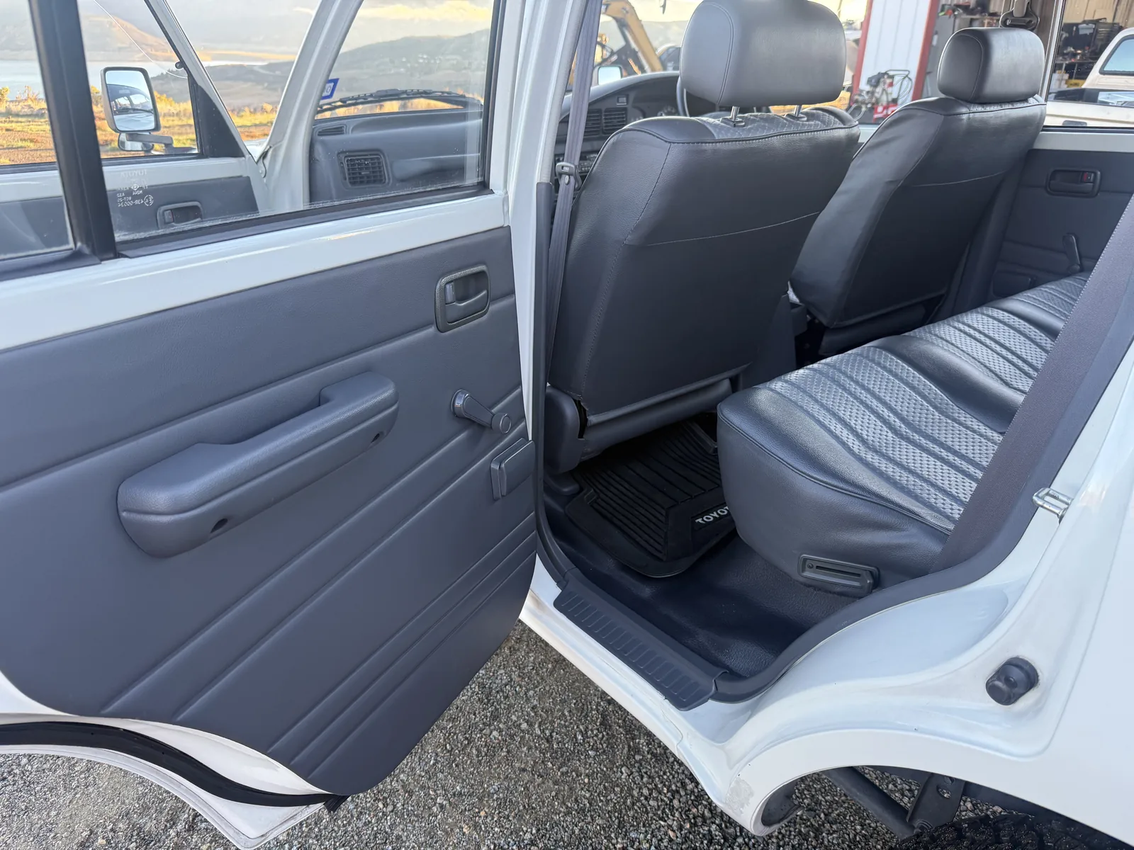 Rear passenger door panel and vinyl rear bench seat