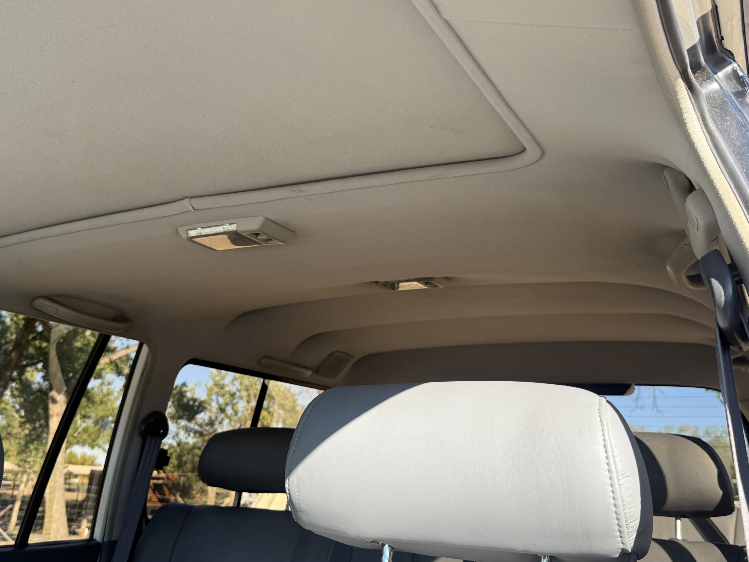 Headliner and overhead lighting in the 1994 FZJ80 cabin