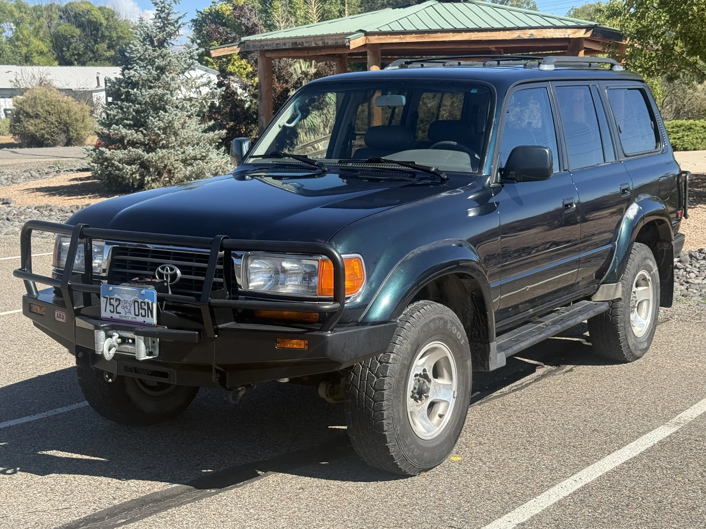 Front view of the 1996 Toyota Land Cruiser FZJ80 with ARB bull bar and Warn winch