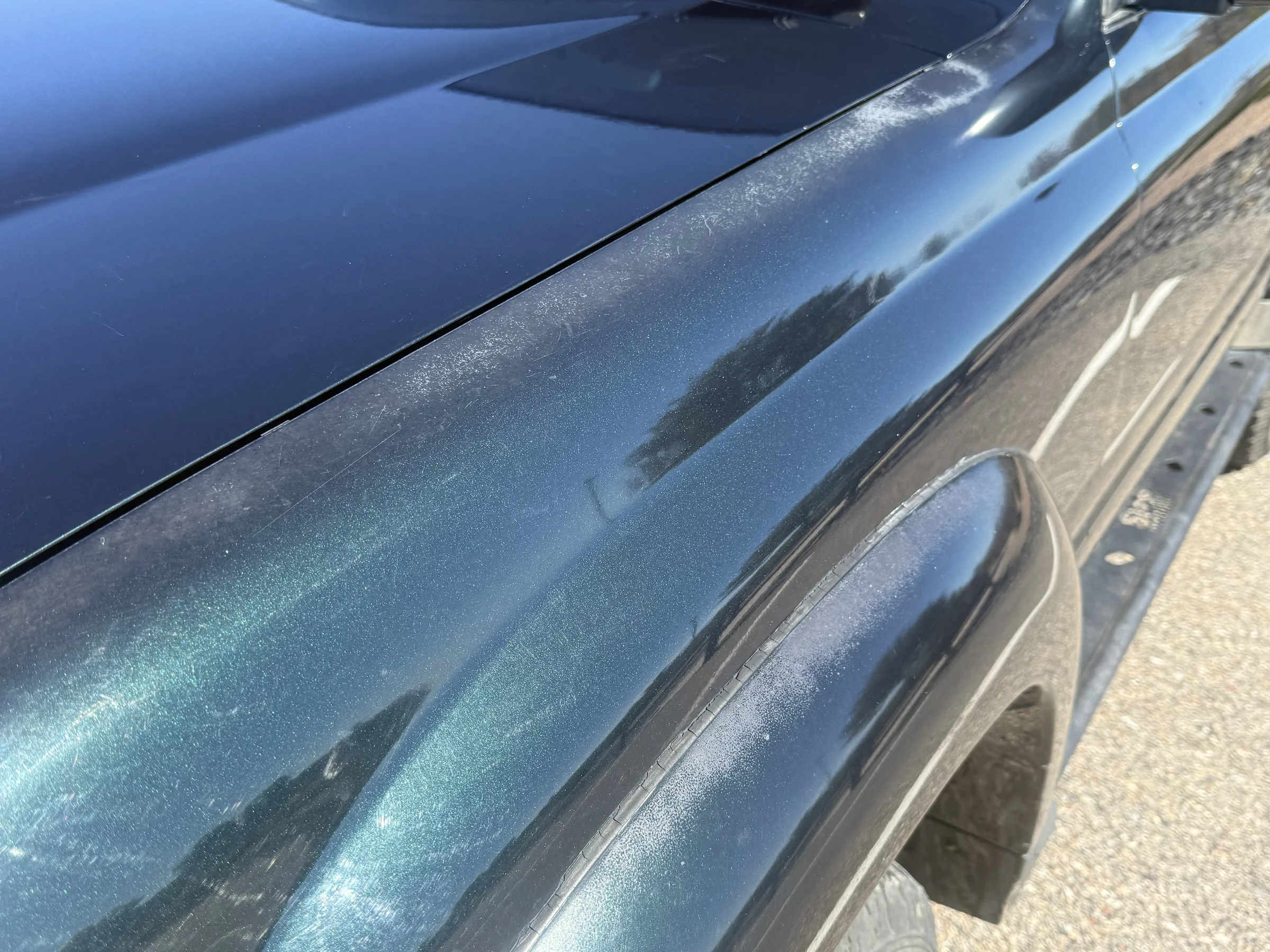 Failing clear coat on the driver-side fender flare