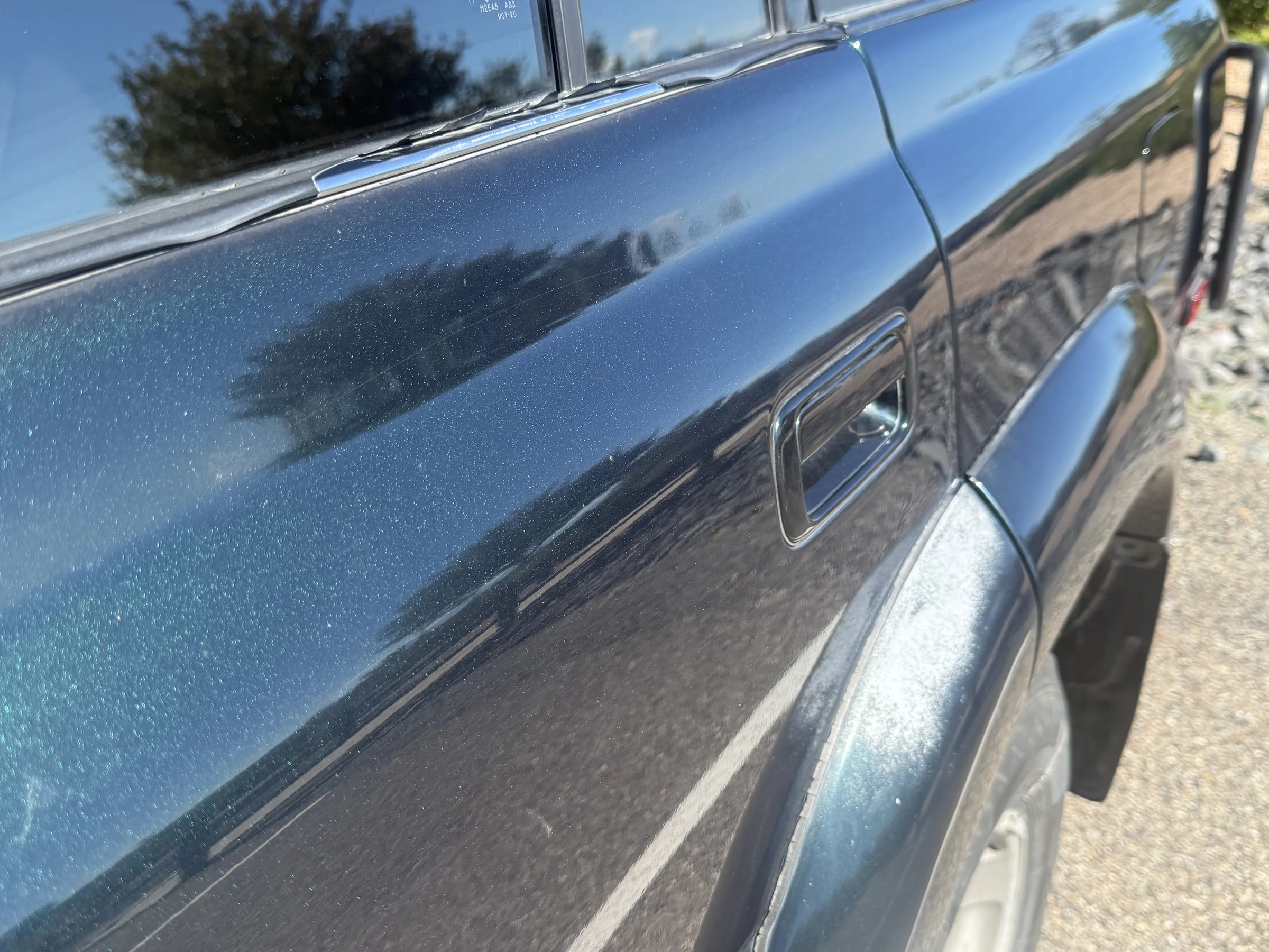 Driver-side body and fender finish detail