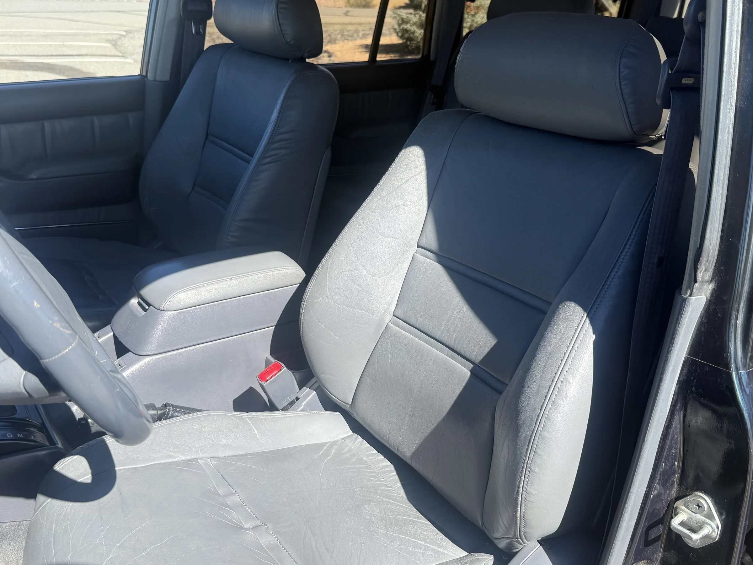 Factory leather front seats in the 1996 FZJ80