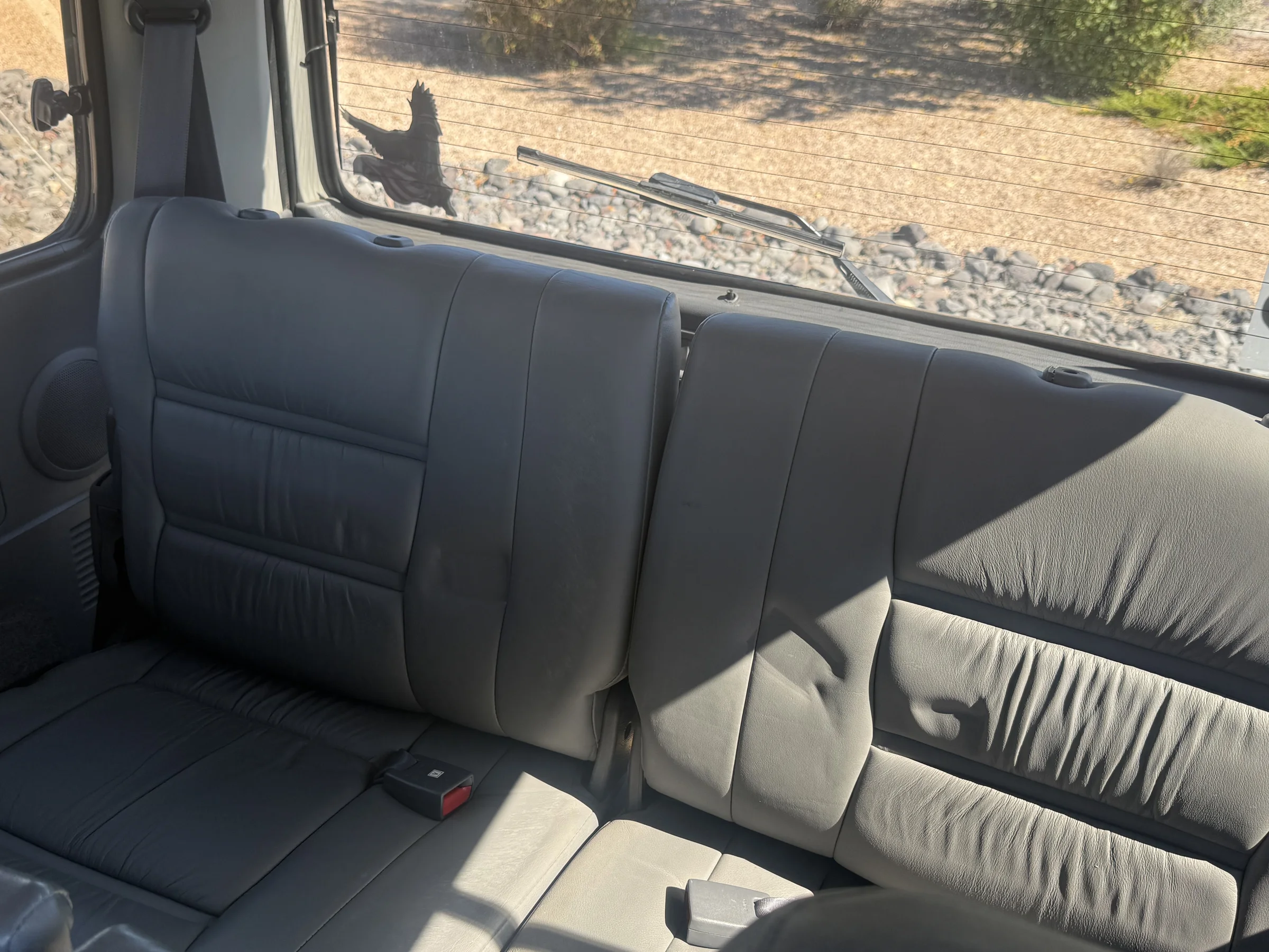 Factory leather rear seating in the 1996 FZJ80
