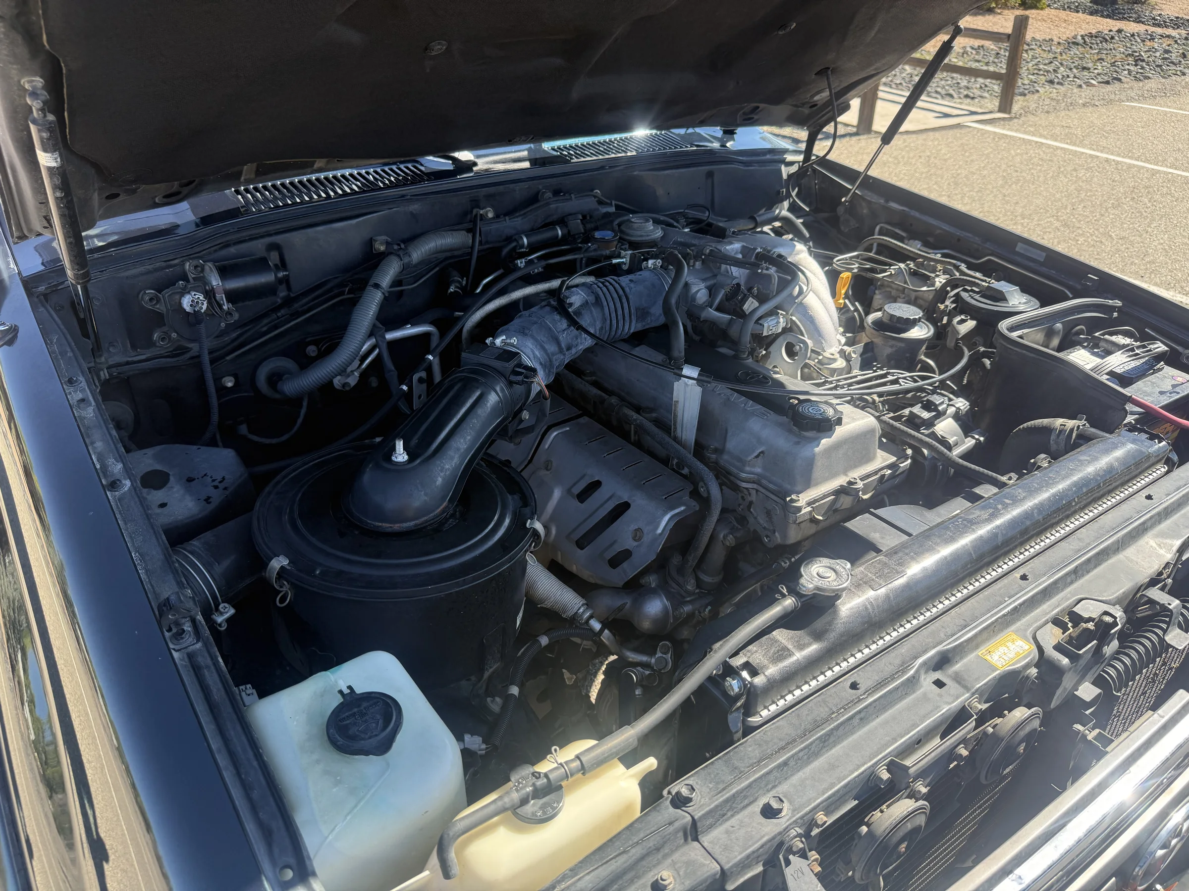 Engine bay component detail on the 1996 FZJ80