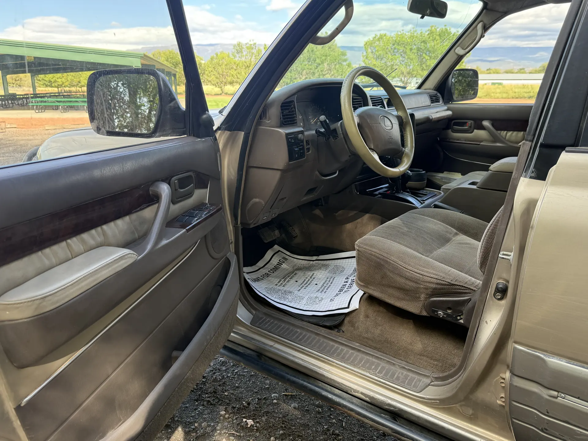 Driver door, steering wheel and cabin of the 1997 Lexus LX450