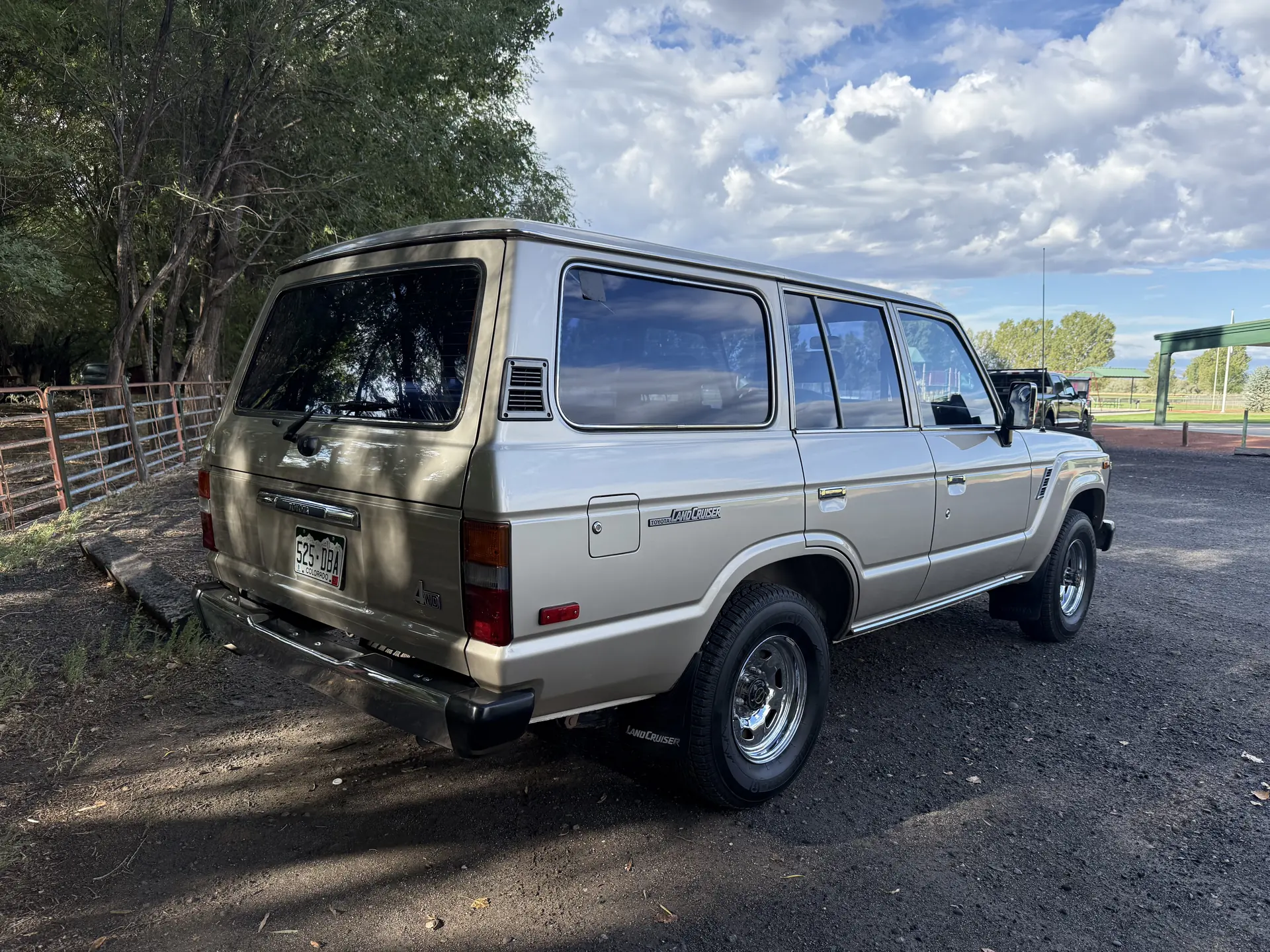 Rear passenger-side exterior of the 1990 Toyota FJ62 Land Cruiser