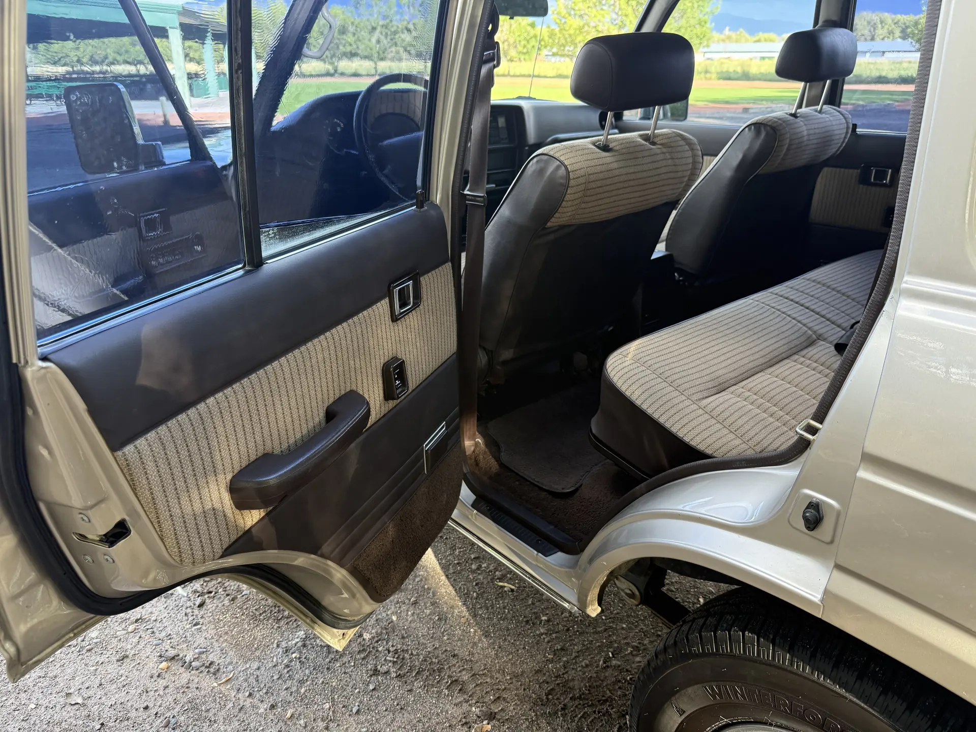 Rear seat and driver-side rear door panel of the 1990 Toyota FJ62