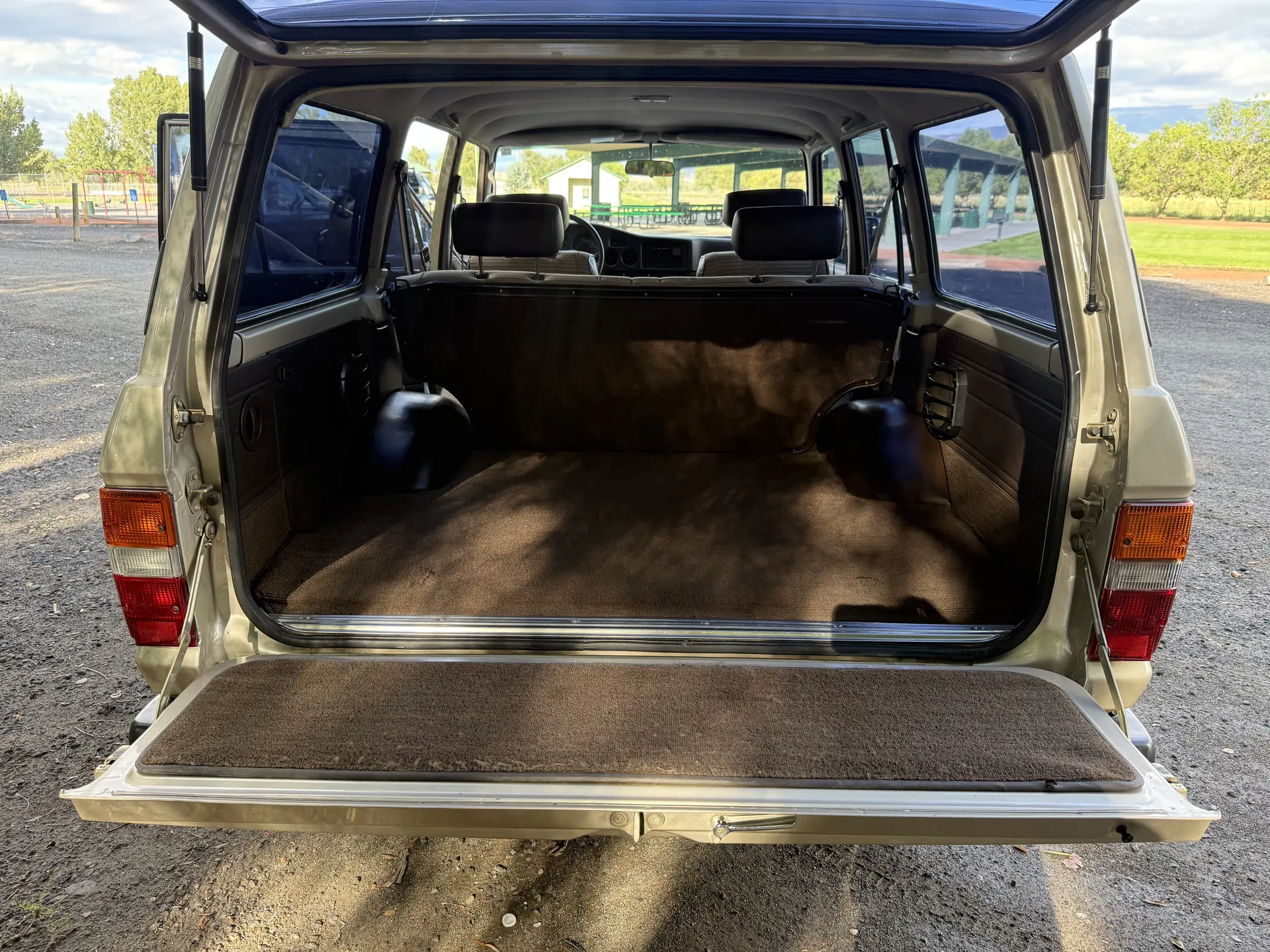 Cargo area and open tailgate of the 1990 Toyota FJ62
