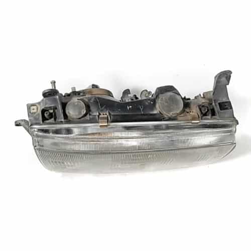 Passenger side headlight assembly from 1992 Fj80 a Proffitts Resurrection Land Cruisers