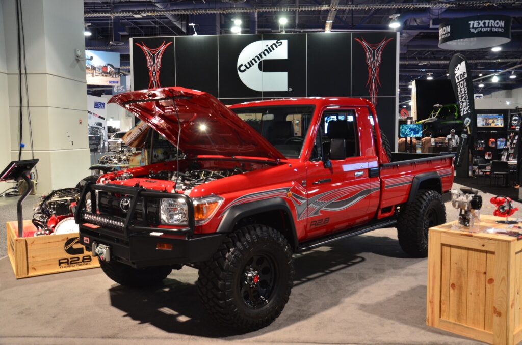 Red HZJ79 Land Cruiser Pickup featured at SEMA