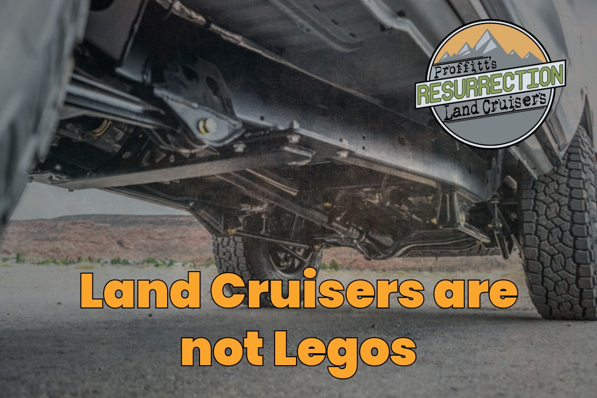 Image of the under side of an FJ62 restoration with an 80 series chassis. Text in yellow reads "Land Cruisers are not Legos"